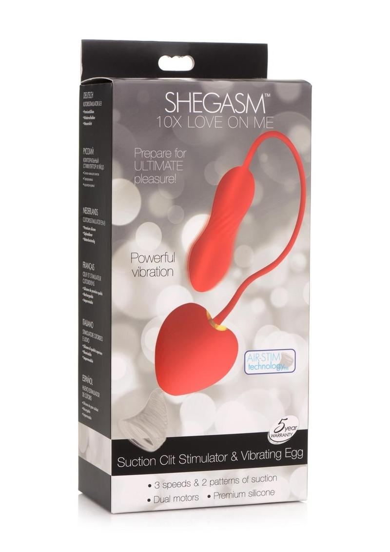 Shegasm Love On Me Rechargeable Silicone Suction Clit Stimulator And Vibrating Egg Red